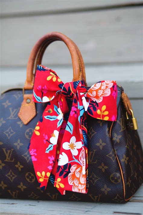 louis vuitton handbag scarf.